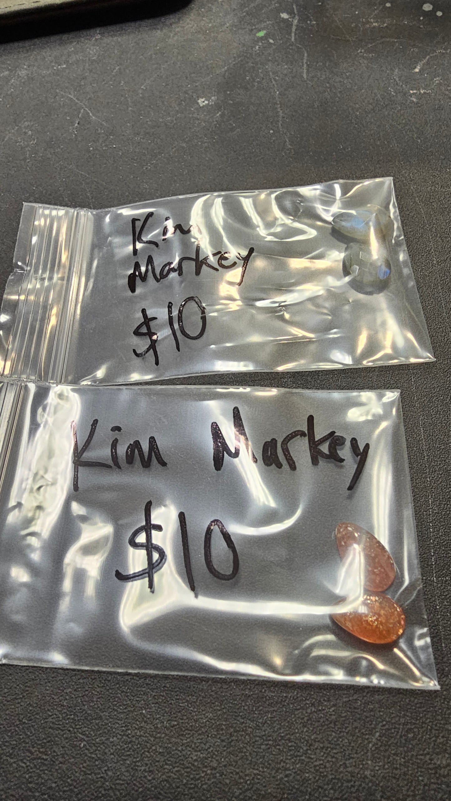 Kim M 7/10 $74