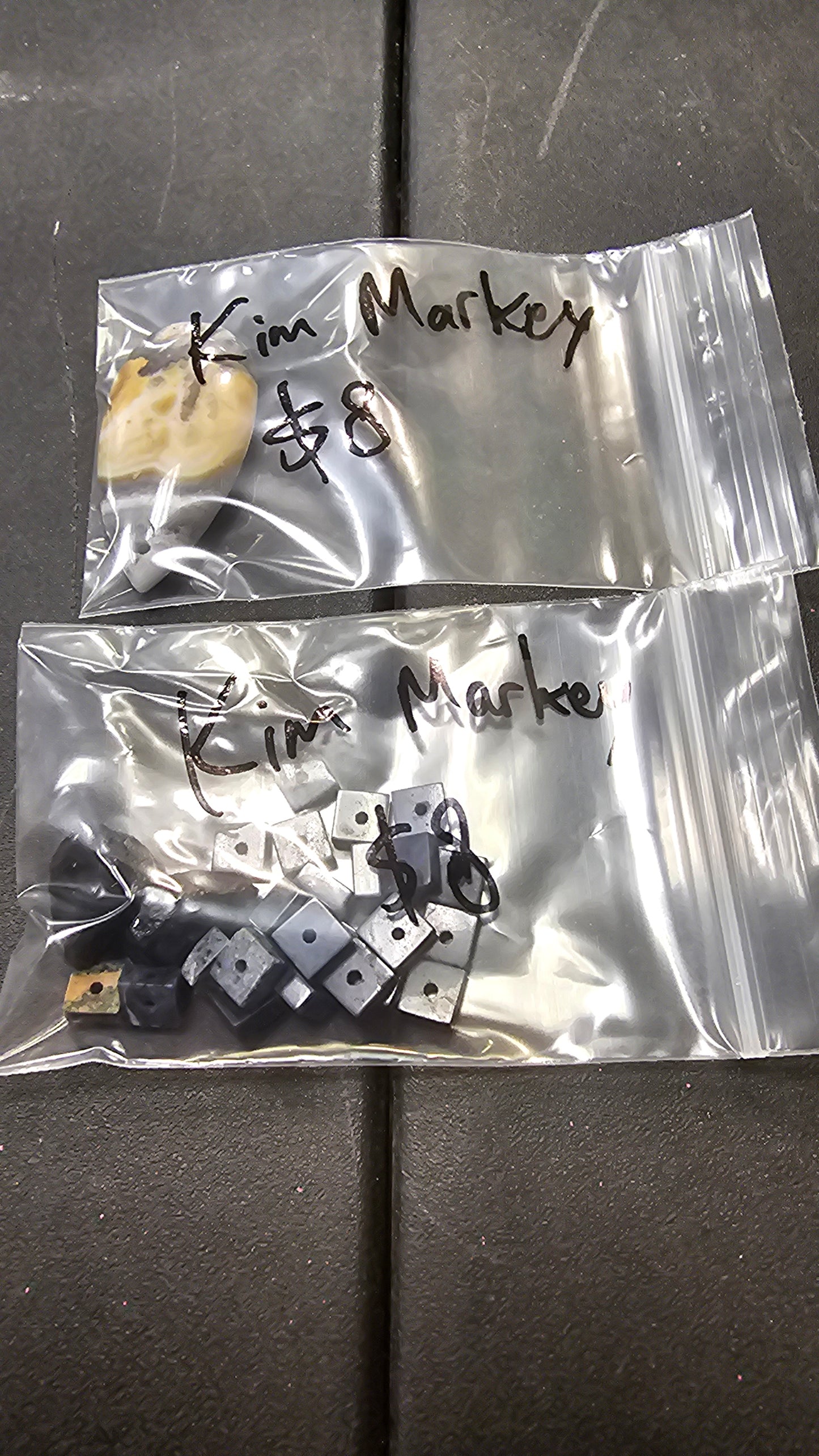 Kim M 8/11 $16